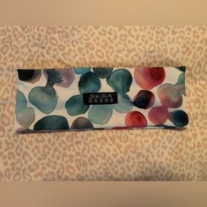 SKIDA headband (ski or outdoor adventure ) used once